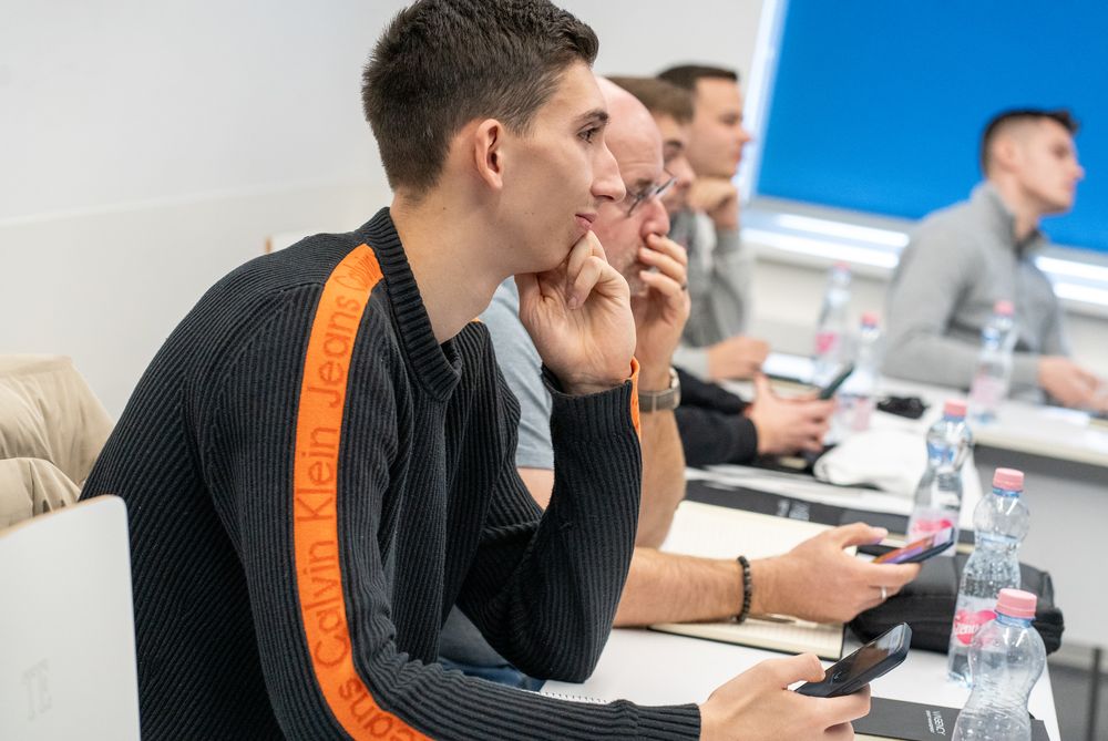 Participants listening during the lecture
